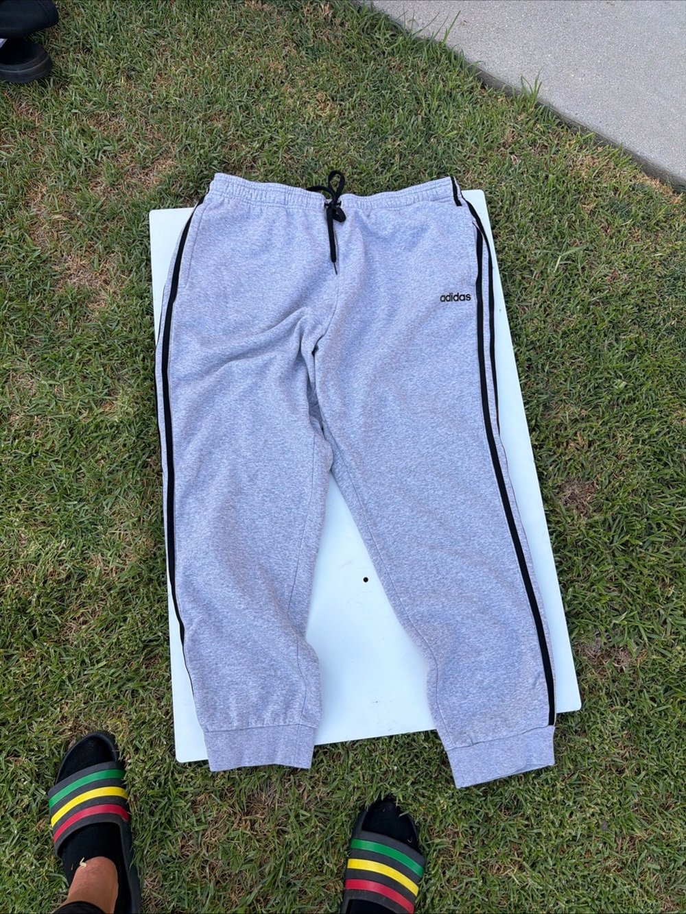 adidas men’s Gray Track Jogger Pants with Black Side Stripes